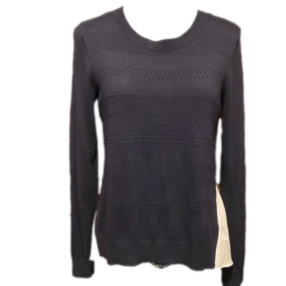 Dalia blue and white pullover sweater with white tail blouse.